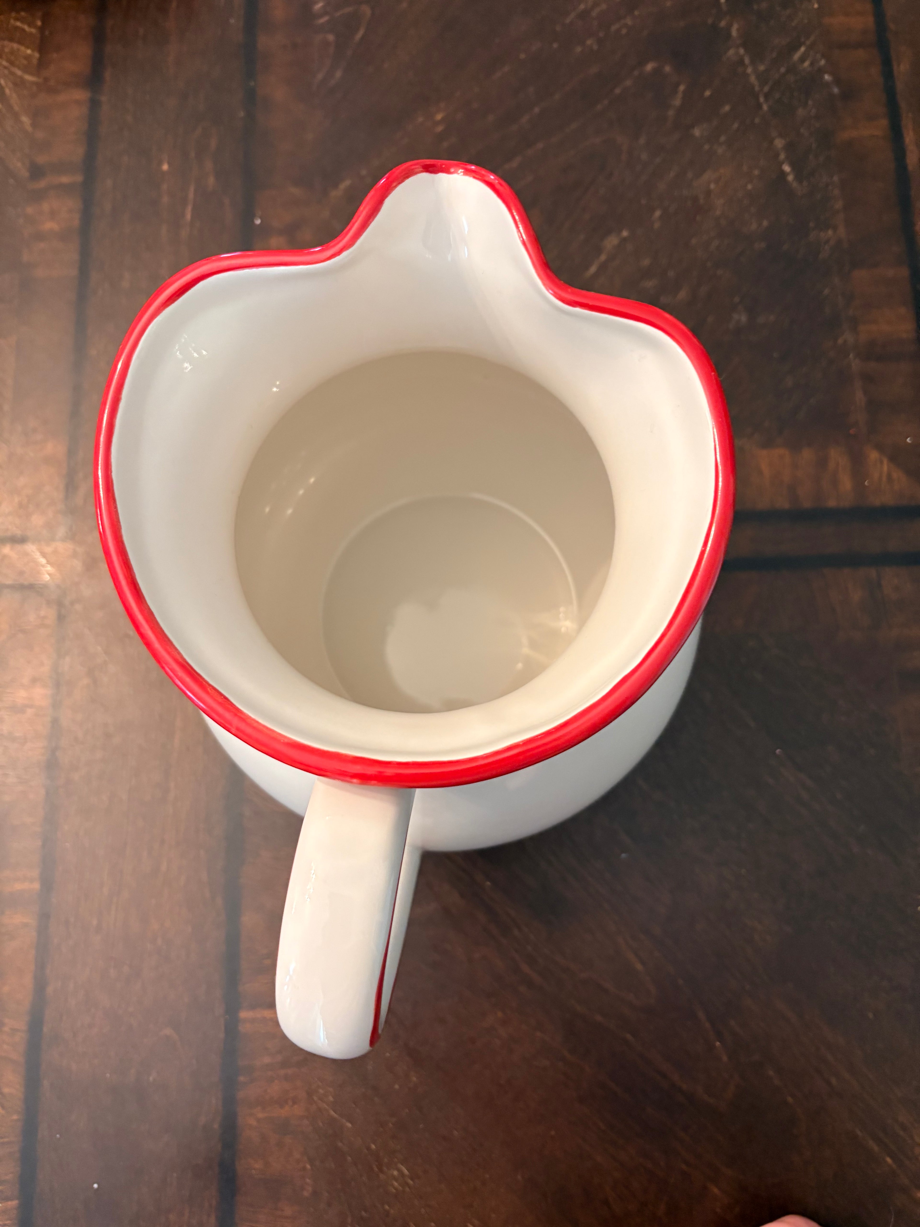 White and Red Pitcher by Home