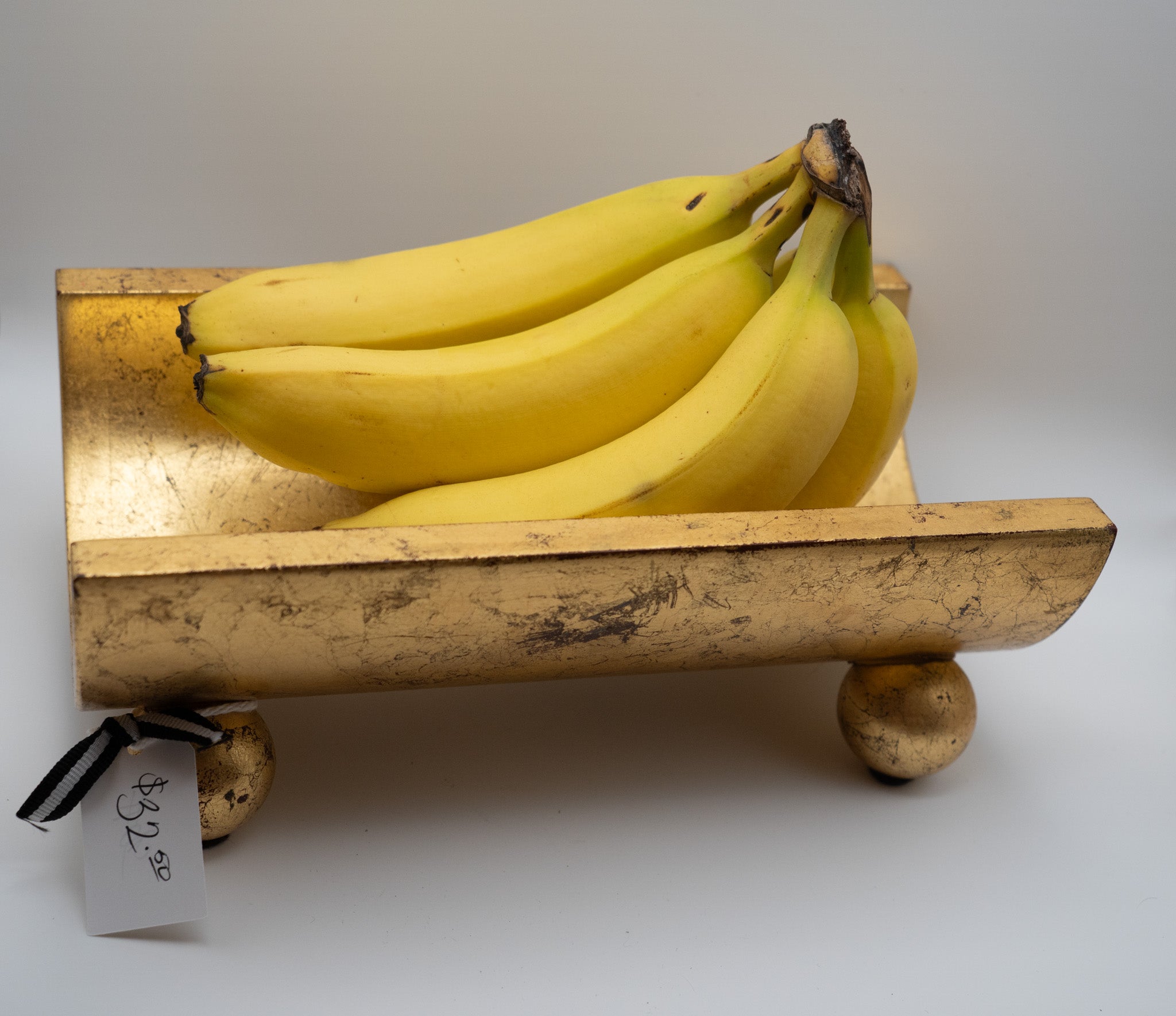 Gold "log" holder