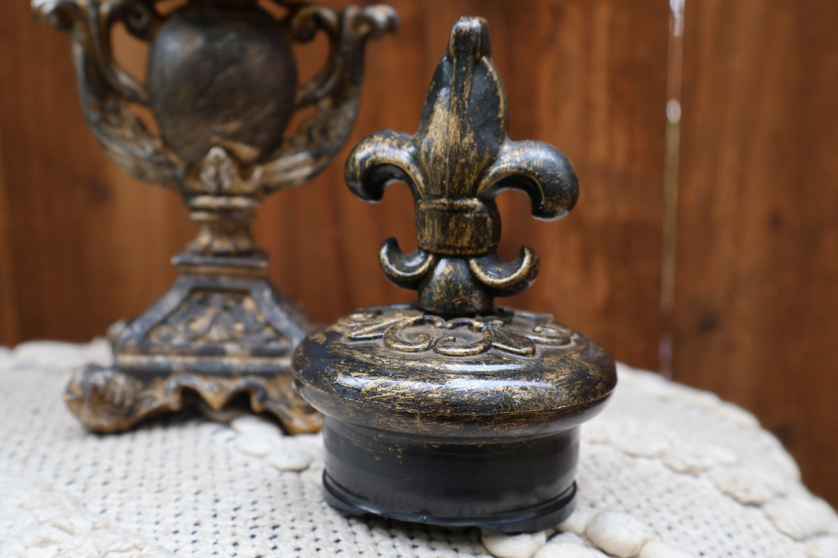 Handcrafted Black & Gold Decorative Pedestal Jar with Fleur-de-Lis Topper